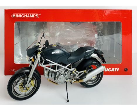 Minichamps 1:12 Scale 'Ducati Monster' Motorcycle - Boxed. P&amp;P Group 2 (£18+VAT for the first lot and £2+VAT for subseque