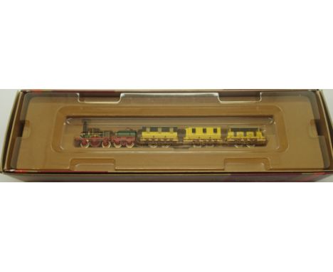 Minitrix N gauge Der Adler set, loco and tender with three coaches. P&P Group 1 (£14+VAT for the first lot and £1+VAT for sub