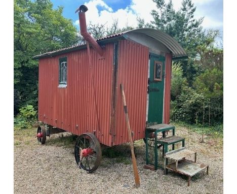 A shepherd's style hut, removed from a Country House near Fordingbridge, with a draw bar, steps and a woodburner, ideal as ad