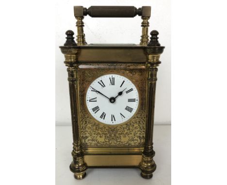 A carriage clock, by Charles Frogsham, in a brass and glass case, 17 cm high 