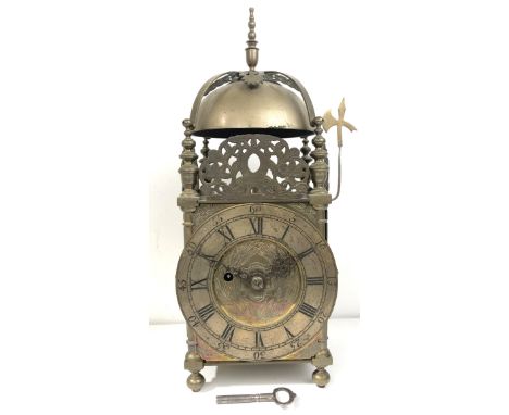 A 17th century style lantern clock, with a single fusee movement striking on a bell, in a brass case, 42 cm high 