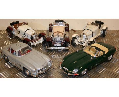 Burago 1/18 scale die cast models; Mercedes Benz 300 SL Gullwing (1954), Mercedes Benz SSK (1928) x 3 and Jaguar E type (1962