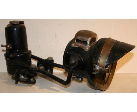 A Powell & Hammer Ltd acetylene lamp and carbide holder.