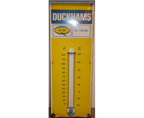 A single sided enamel advertising thermometer/sign, for Duckhams Motor Oil, 91 x 33 cm.