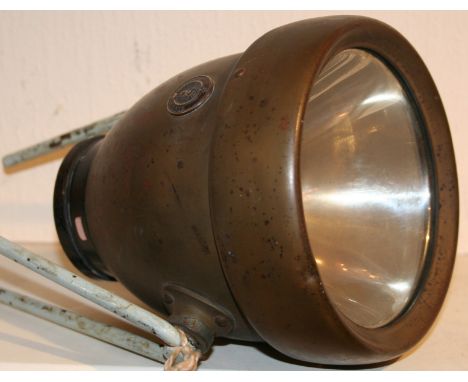 A Lucas type SS30 electric motorcycle lamp.