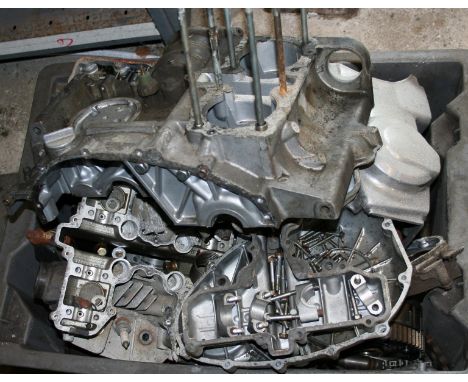 A Kawasaki 750 cc engine, number KZ 750 BE 017719 (dismantled, please check components) and a Honda CB 500 cc engine, number 