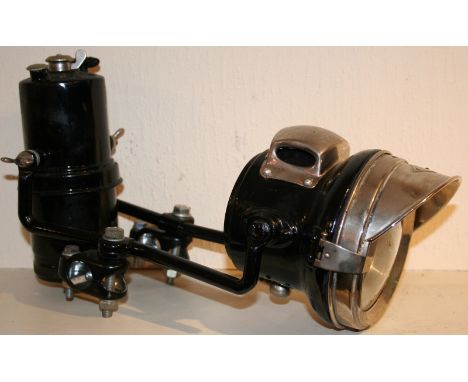 A Miller acetylene lamp and carbide holder.