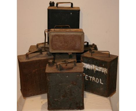 Eight various petrol cans, to include Esso, Pratts and Shell-Mex (8).