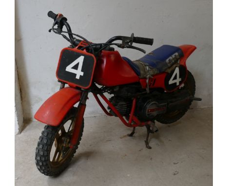 A Honda 50 cc QR children's trials motorbike, circa 1980's. Frame number AE01 - 1002942. Well used, for restoration, engine t