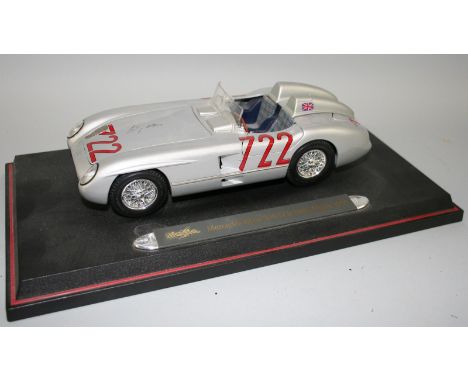 Stirling Moss - a signed die cast  Maisto scale 1/18 model of a Mercedes Benz 300 SLR, in Mille Miglia 1955 race colours, mou