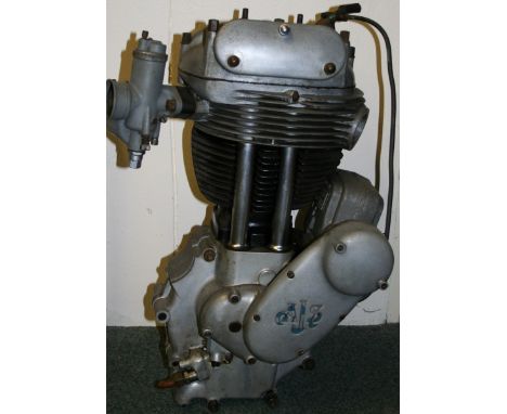 A 1956 AJS model 18s 500 cc single cylinder engine with Amal carburettor, number 56/18s 29121. 