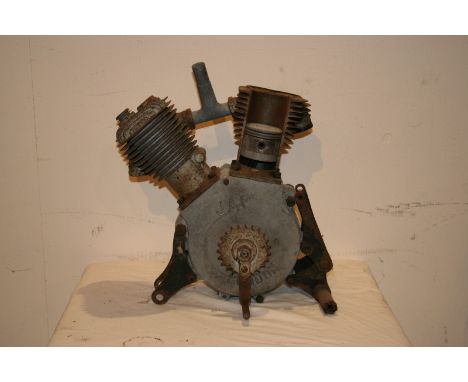 A JAP V - twin cylinder cut away engine with turning handle, number possibly 22105 1912.