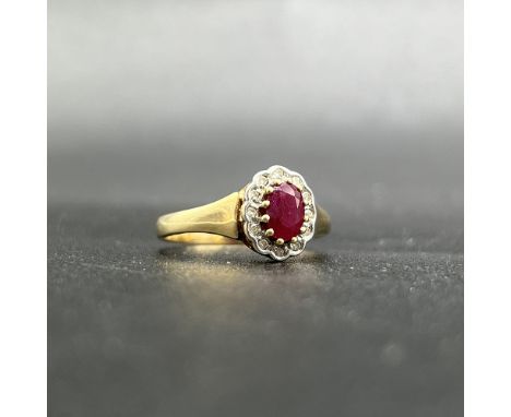 9ct yellow gold ruby and diamond ring,
nice thick shank,
2.3 grams,
hallmarked,
size O,
oval shaped