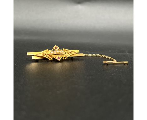 15ct yellow gold Victorian seed pearl and ruby brooch,
with safety chain,
5 seed pearls and 2 rubies,
46mm x 13mm,
stunning p