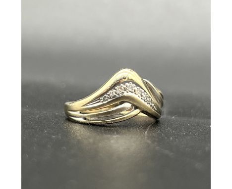 9ct yellow gold diamond twist dress ring,
size K,
2.1 grams,
hallmarked