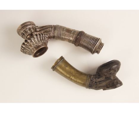 A large Burmese white metal pipe, 19th century, the base inset with a 1 kyat coin, provenance: The Trevor Barton collection, 