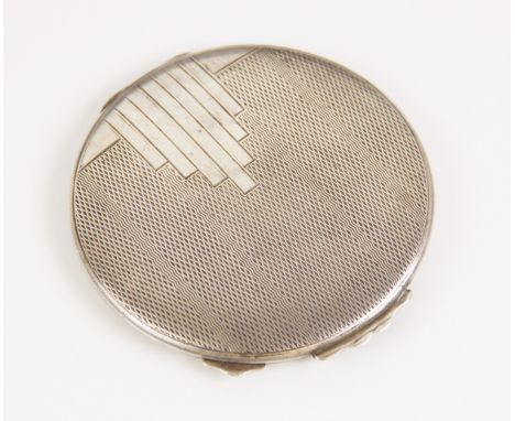 A George VI Art Deco silver compact, W I Broadway &amp; Co, Birmingham 1946, of circular form with engine turned detail, open