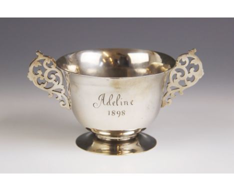 A Victorian silver twin-handled trophy cup, Wakely &amp; Wheeler, London 1897, the circular bowl with flared rim on circular 