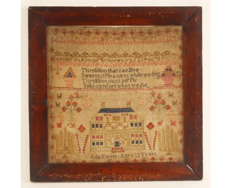A needlework sampler, probably early 19th century, worked by Ada Davies aged 13, the lower section depicting a house, gardens