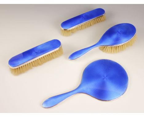 An Art Deco silver and enamel dressing table set, Albert Carter, Birmingham 1924, comprising mirror, hairbrush and two clothe