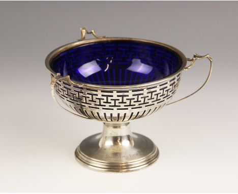 A George V silver trophy cup, S Blanckensee &amp; Son Ltd, Birmingham 1911, the circular bowl with pierced decoration upon st