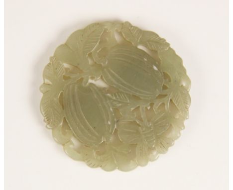 A Chinese jade roundel, of reticulate circular form, carved with vines and two fruiting gourds with a moth, 5.4cm wide  CONDI