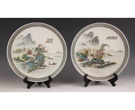 A pair of Chinese porcelain plates, Republic period style, each of circular form and decorated in a famille verte palette wit