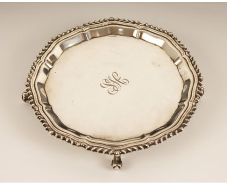 A silver salver, J B Chatterley &amp; Sons Ltd, Birmingham 1967, of shaped circular form with gadroon rim on four scroll feet