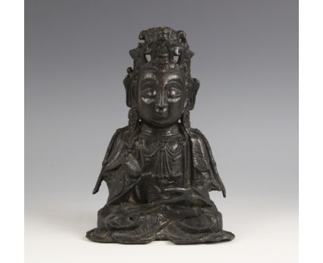 A Sino-Tibetan bronze figure of buddha/boddhisattva, seated in dhyanasana, right hand in raised shuni mudra, left hand in dhy