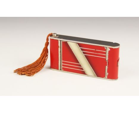An Art Deco chrome plate, red and cream enamel combination compact, cigarette case and lipstick in the form of a folding came