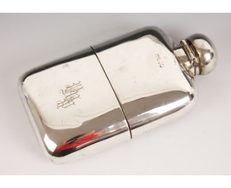 A Victorian silver hip flask, Louis Dee, London 1881, of curved rectangular form with bayonet clasp cap, detachable stirrup c