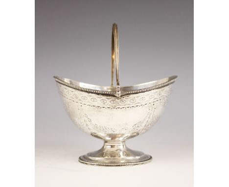 A Victorian silver swing-handled bon-bon dish, London 1868 (makers mark worn), the oval bowl raised on pedestal foot, beaded 