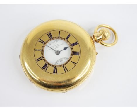 An 18ct gold half hunter pocket watch, the circular white dial with Roman numerals, subsidiary dials running seconds up or do