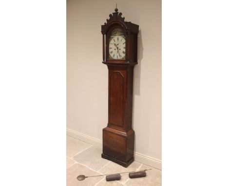 A George III 8 day longcase clock, signed indistinctly 'Scott Newcastle', the arched hood with a fretwork pediment above flut