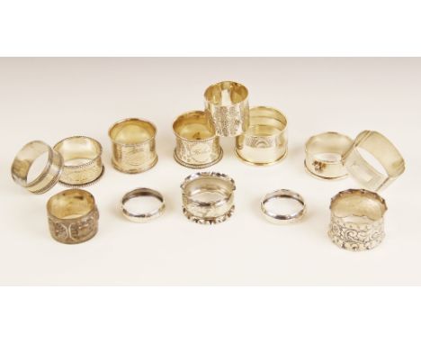 A selection of Victorian and later silver and silver coloured napkin rings, to include an Elizabeth II example with applied P