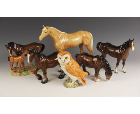 Four Beswick horse models, comprising: a Palomino Large Racehorse, model number 1564, printed mark, 28.5cm high; a Mare And F