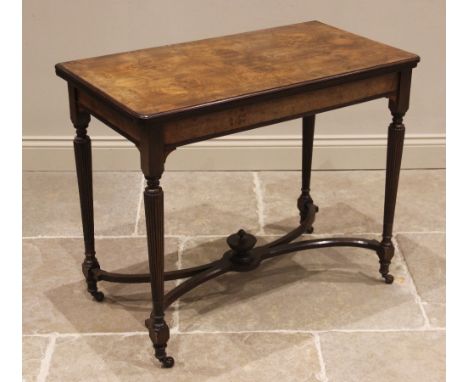 A Regency style walnut tea table, late 19th century, the burr walnut quarter veneered top with rounded front corners, upon re