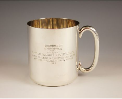 A Victorian silver mug, Thornhill &amp; Co, London 1885, of cylindrical form with C-scroll handle, inscription 'Presented to 