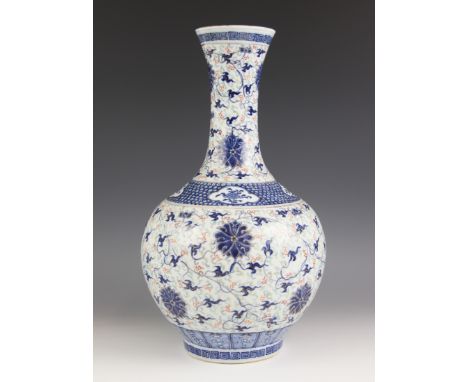 A Chinese porcelain 'Lotus' vase, 19th century, of globular form with cylindrical flared neck, decorated in blue and white wi