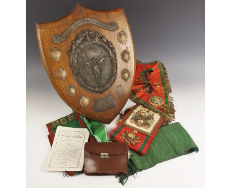 An Art Deco Ancient Order Of Foresters Altrincham And Lymm District Juveniles presentation shield, dated 1931, the oak shield
