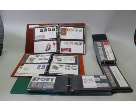 Seven well filled albums of first day cover stamps plus two albums of stamp sets 1970's/80's