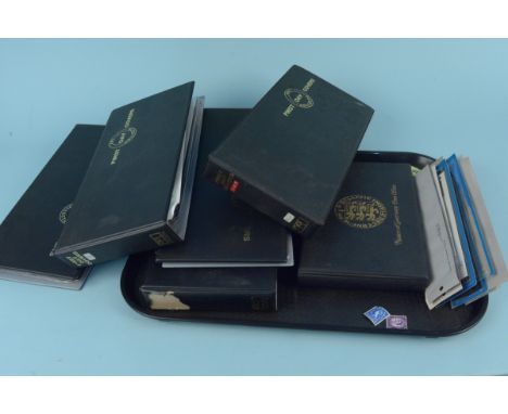 Five albums of first day covers plus an album of Guernsey stamps and loose mounts
