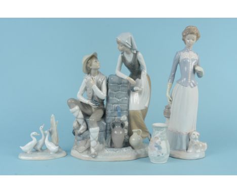 A large Nao figure group of a boy and girl 33cm tall, a Lladro style lady 36cm tall, a Nao three duck group plus a small Llad