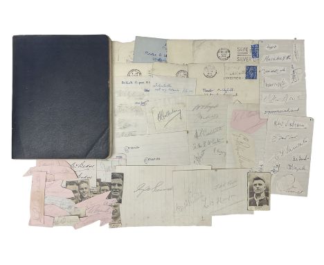 Football signatures - school exercise book as an autograph album containing stuck down leaves from an earlier album with team