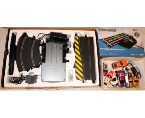 A Scalextric "Need for Speed" part set in original box, a selection of unboxed Scalextric cars and a Scalextric Power Base up