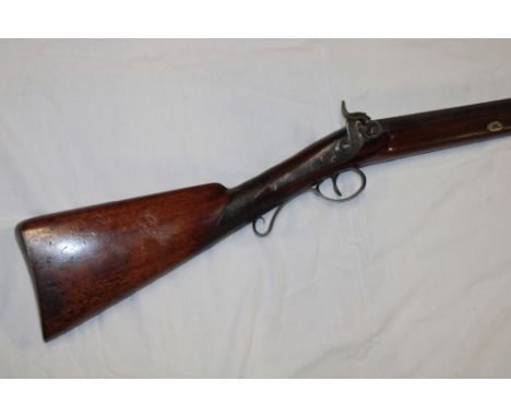 A 19th Century percussion single barrel sporting gun by Tate and Willis with 32½" barrel, chequered walnut stock with steel f
