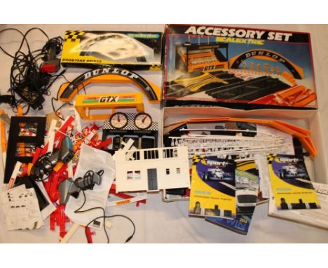 A Scalextric boxed accessory set and a selection of various boxed Scalextric racing accessories
