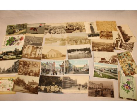 Various black and white and colour postcards, mainly topographical including early photographic Redruth fair postcard, greeti