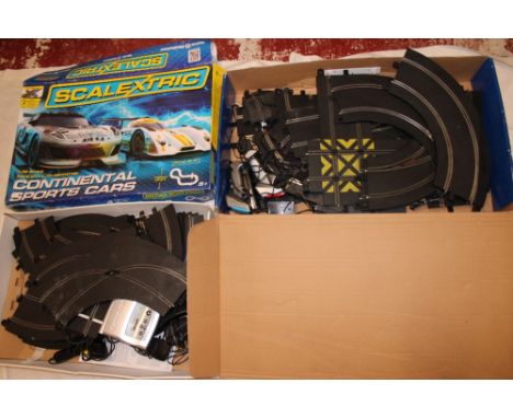 Two boxed Scalextric part sets including Digital Super-Cars and Continental Sports-Cars (minus cars) (2)