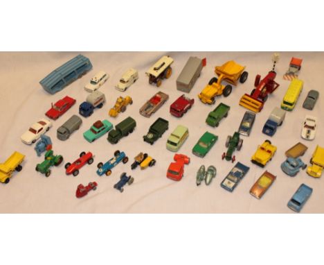 A selection of Lesney/Matchbox die-cast vehicles including car-transporter, showmans engine, motorcycle and sidecar etc